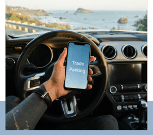 TradeParking app on phone in car